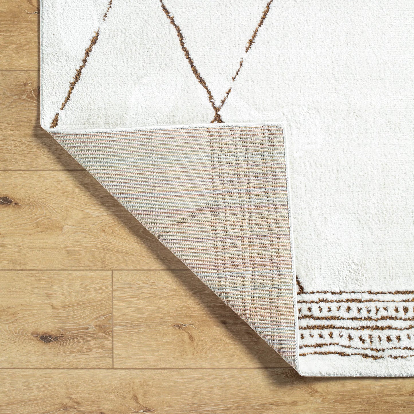 005 SI-2167741,SI-2167742,SI-2167743,SI-2167744,SI-2167745 | Closeup | Freud Rug - 492361 by Livabliss in ivory, brown. Made from polyester in a unique style.