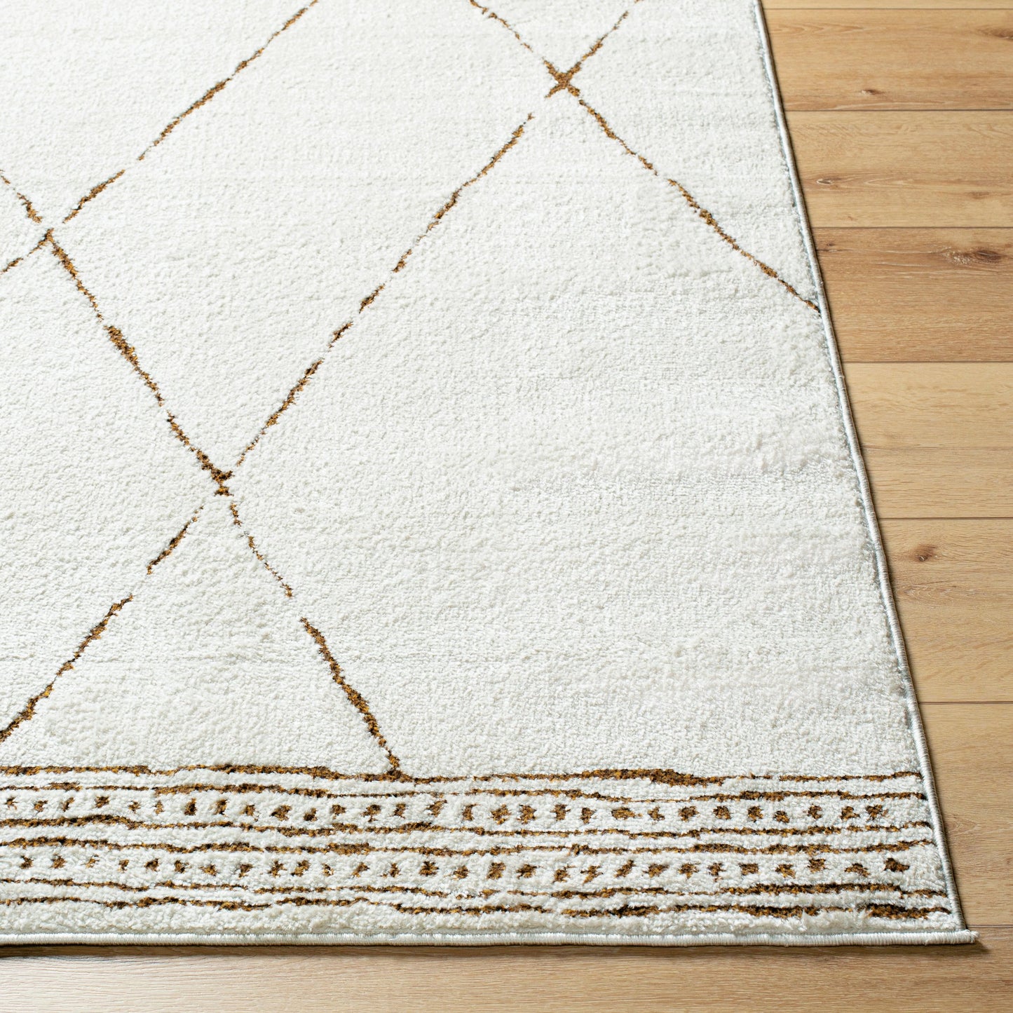 004 SI-2167741,SI-2167742,SI-2167743,SI-2167744,SI-2167745 | Closeup | Freud Rug - 492361 by Livabliss in ivory, brown. Made from polyester in a unique style.