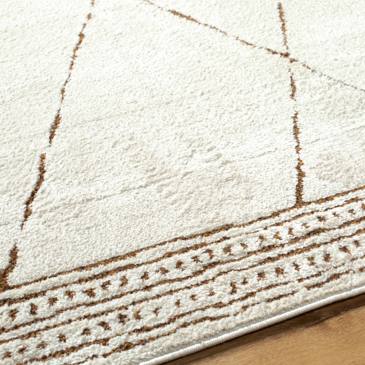 006 SI-2167741,SI-2167742,SI-2167743,SI-2167744,SI-2167745 | Closeup | Freud Rug - 492361 by Livabliss in ivory, brown. Made from polyester in a unique style.