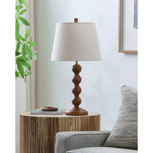 Felipe Accent Table Lamp by Livabliss in body: dark brown; base: dark brown; shade (outside): beige; shade (inside): white; finial: dark brown; harp: metallic - nickel; cord: black and hand painted. Made from rubber wood, linen