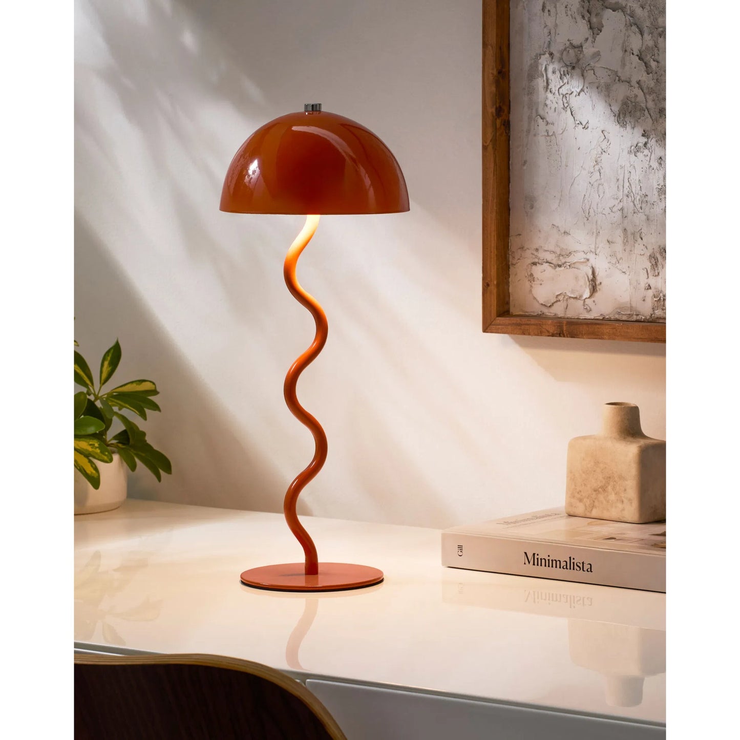 002 SI-2244622 | Lifestyle | Toricella Wavy Accent Table Lamp by Livabliss in body: orange; base: orange and hand paintedhand painted. Made from iron in a eclectic & global style.