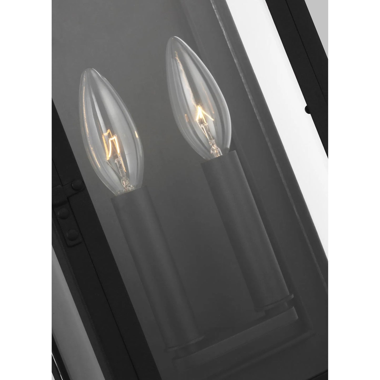 008 SI-2234117 | Closeup | Hingham Medium Outdoor Wall Lantern by Visual Comfort & Co. in textured black. Made from stonestrong in a unique style.