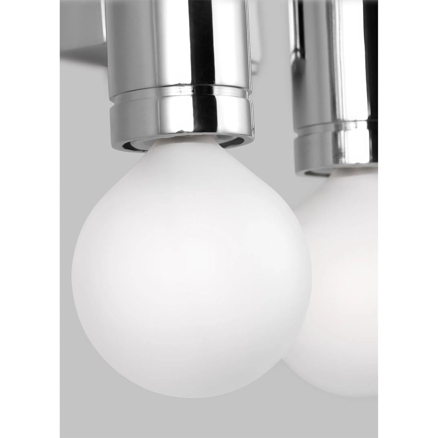 005 SI-2235889 | Closeup | Beckham Modern Triple Sconce by Visual Comfort & Co. in polished nickel. Made from steel in a unique style.