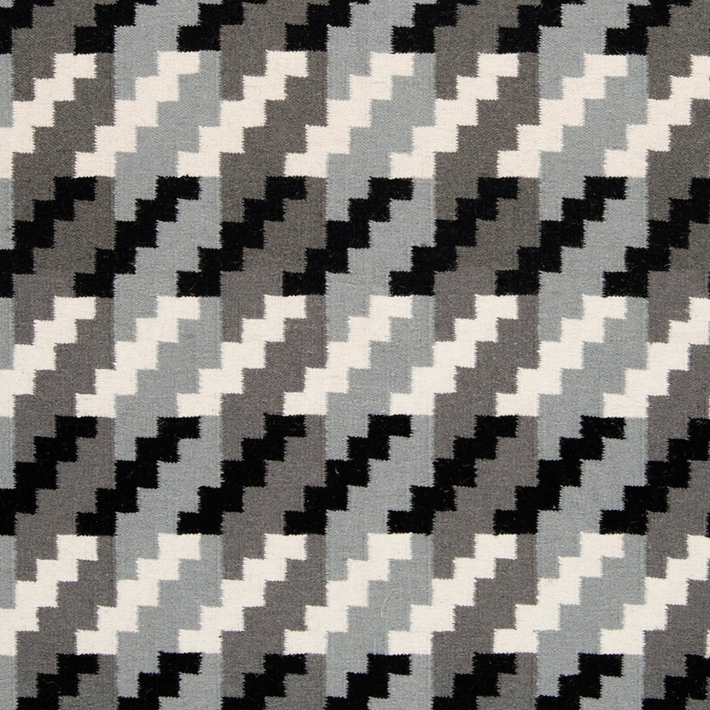 004 31733-3196,31733-3199 | Closeup | Frontier Rug - 1327 by Surya in slate, black, light beige. Made from 100% wool in a unique style.