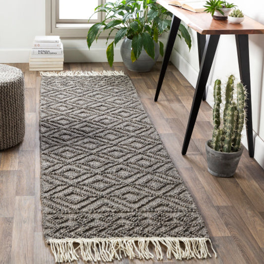 Farmhouse Tassels FTS-2302 Rug by Surya in black, white. Made from 60% wool, 40% cotton in a unique style.