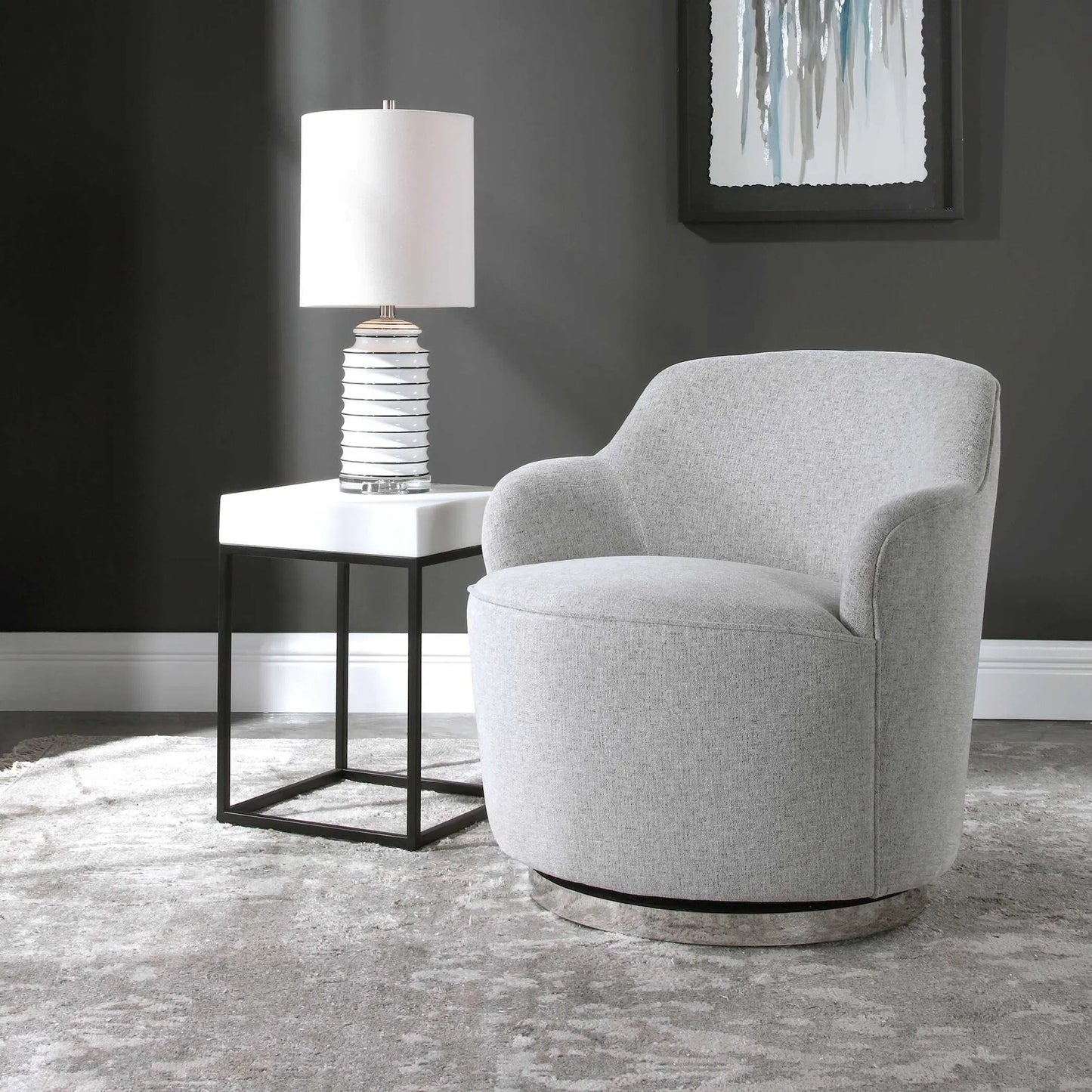009 SR-766710 | Closeup | Hobart Casual Swivel Chair by Uttermost. Made from plywood, stainless steel, fabric, foam in a modern style.