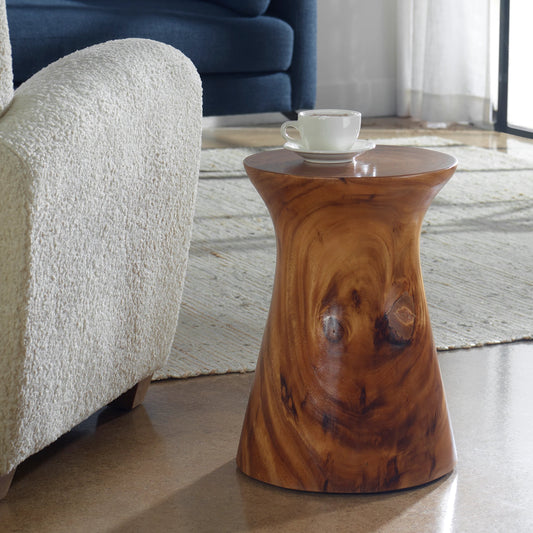 Swell Accent Table by Uttermost in natural honey. Made from suar wood in a rustic style.