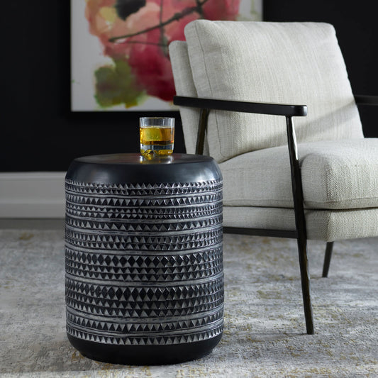 Cutting Edge Tribal Accent Table by Uttermost in black. Made from resin in a eclectic & global style.