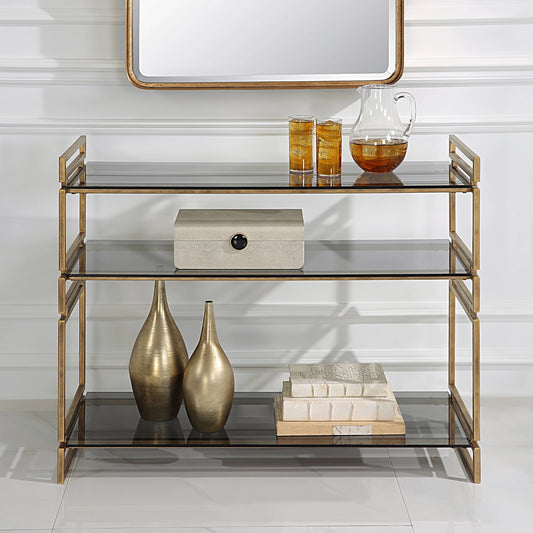 Stacked Up Console Table by Uttermost in antiqued gold. Made from iron, glass in a modern style.