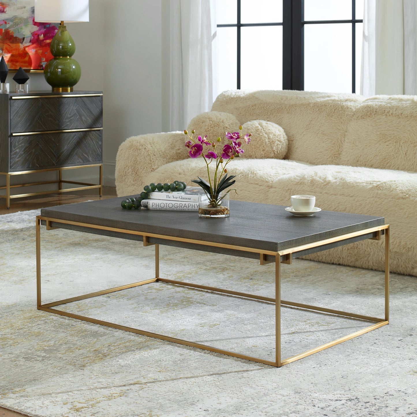 004 SI-2146850 | Lifestyle | Surround Sark Coffee Table by Uttermost in dark walnut. Made from stainless steel, mdf, acacia veneer in a modern style.