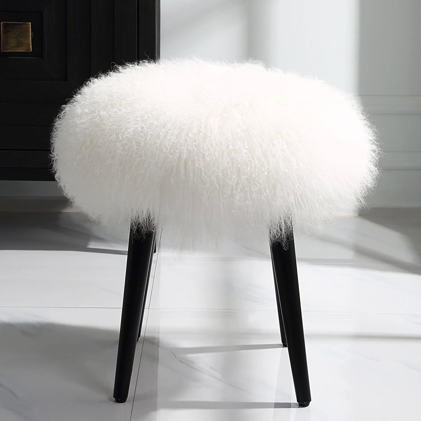 005 SI-2262258 | Lifestyle | Wooly Sheepskin Accent Stool by Uttermost in black. Made from rubber wood, real sheepskin, foam, plywood in a unique style.