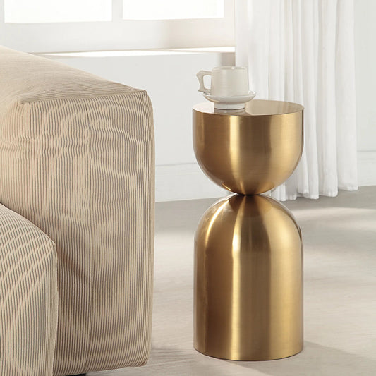 Vessel Accent Table by Uttermost in gold. Made from stainless steel in a modern style.