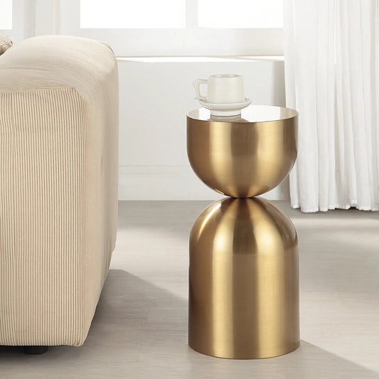 Vessel Accent Table by Uttermost in gold. Made from stainless steel in a modern style.