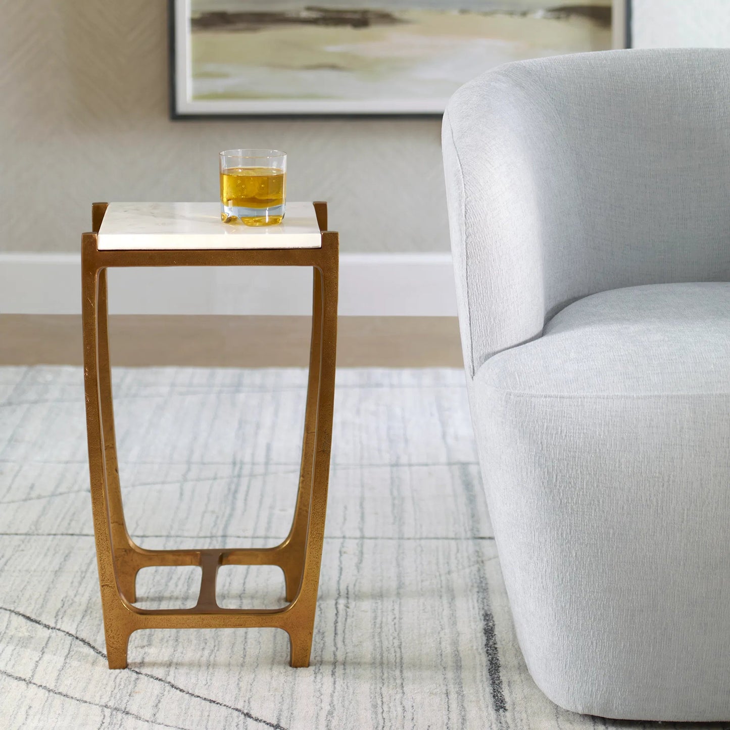 006 SI-2262346 | Lifestyle | Affinity Accent Table by Uttermost in gold. Made from aluminum, marble in a modern style.
