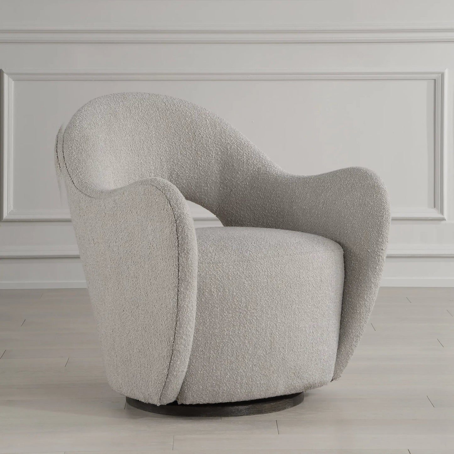 004 SI-2262267 | Unknown | Wander Swivel Chair by Uttermost in oat and dark walnut. Made from bent wood, hardwood, fabric, foam in a unique style.