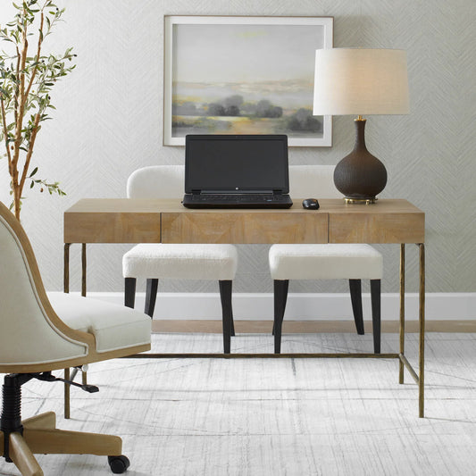 Aristotle Natuiral Modern Desk by Uttermost in gold. Made from cast iron, mdf, pramavera veneer in a transitional style.