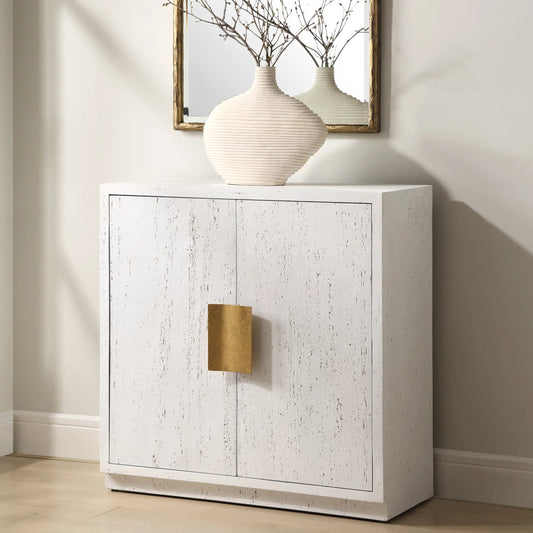 Emma 2 Door Cabinet by Uttermost in gold. Made from mdf, resin, iron in a transitional style.