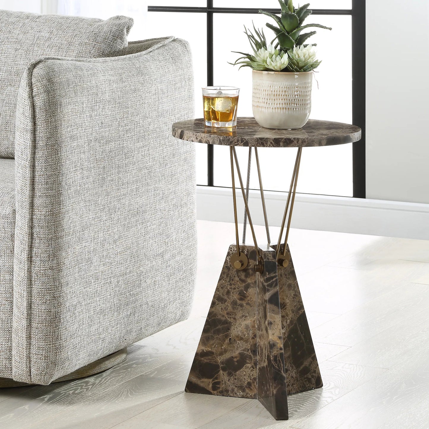 004 SI-2262500 | Unknown | Levitate Accent Table by Uttermost in brass. Made from marble, iron in a unique style.