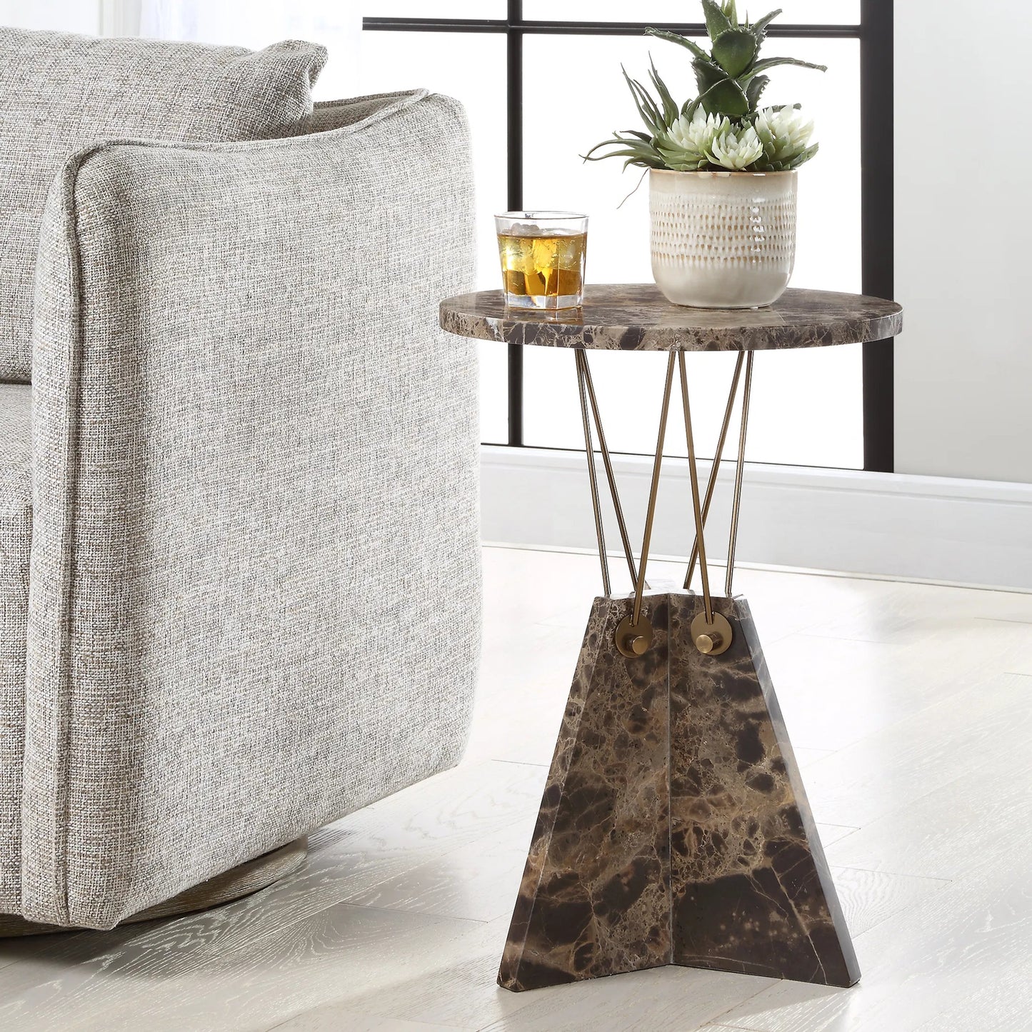 003 SI-2262500 | Lifestyle | Levitate Accent Table by Uttermost in brass. Made from marble, iron in a unique style.