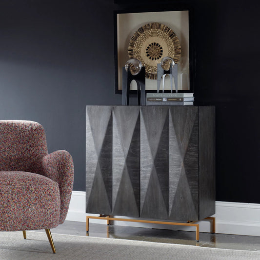 Marico 2-Door Mindi Cabinet by Uttermost in gold. Made from mdf veneer mindi, mindi wood, metal leg in a traditional style.