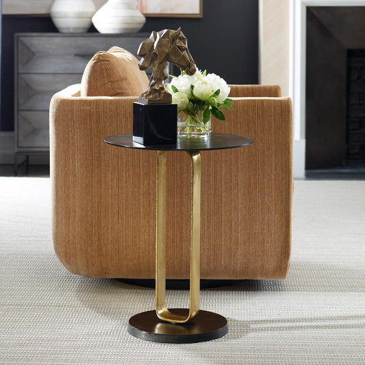 Aperture Accent Table by Uttermost in brass. Made from aluminum in a modern style.
