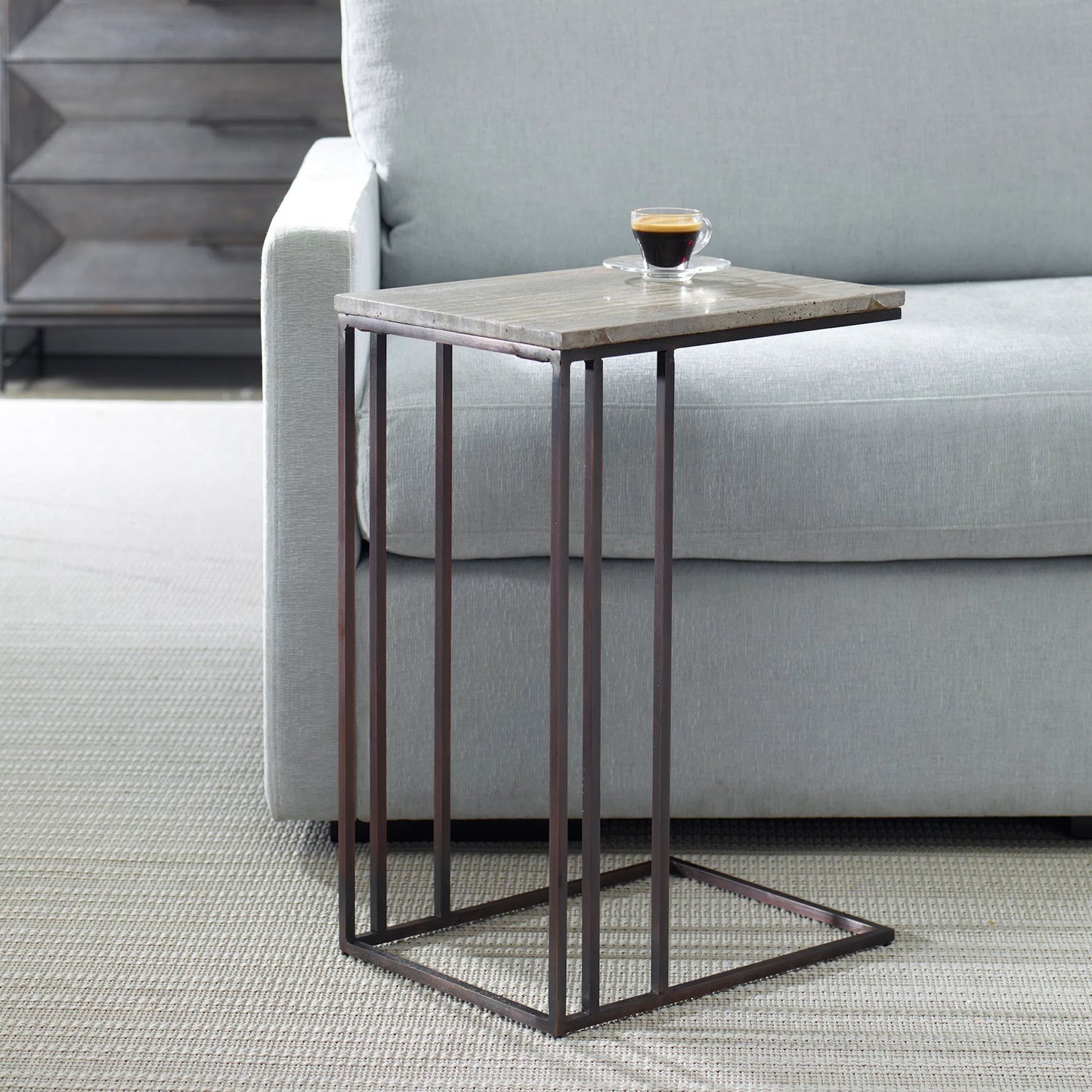 008 SI-2262503 | Lifestyle | Theodore Travertine Accent Table by Uttermost in dark bronze. Made from marble, iron in a modern style.