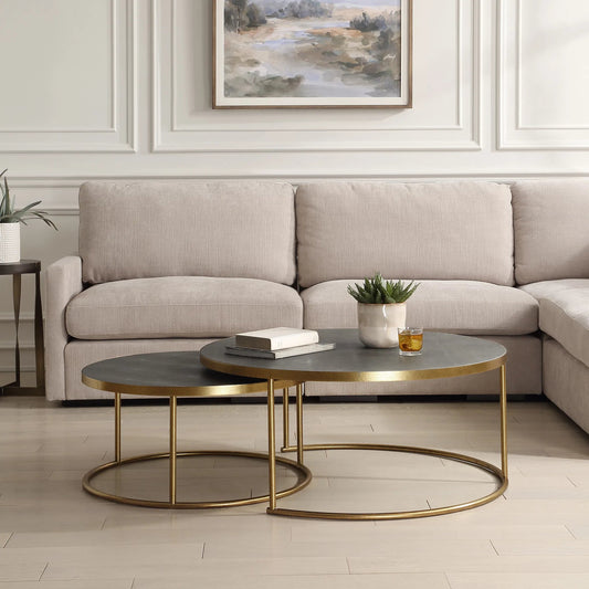 Aragon Nesting Coffee Tables by Uttermost in brass. Made from pu leather, mdf, metal in a modern style.