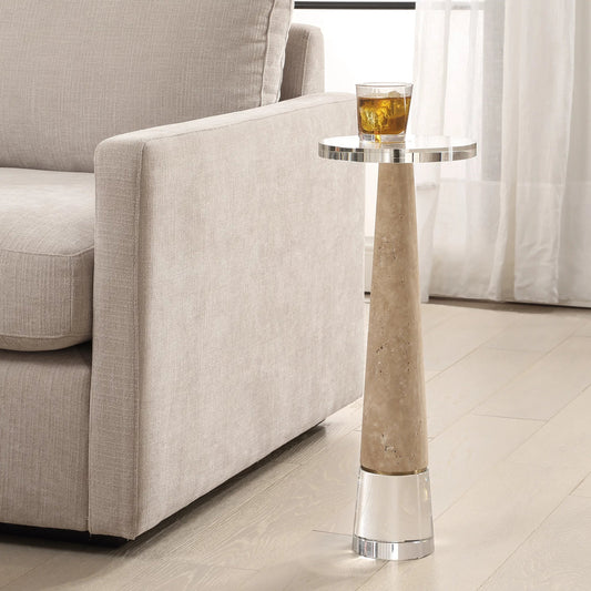 Niari Travertine Drink Table by Uttermost in gold. Made from crystal, travertine, steel in a transitional style.