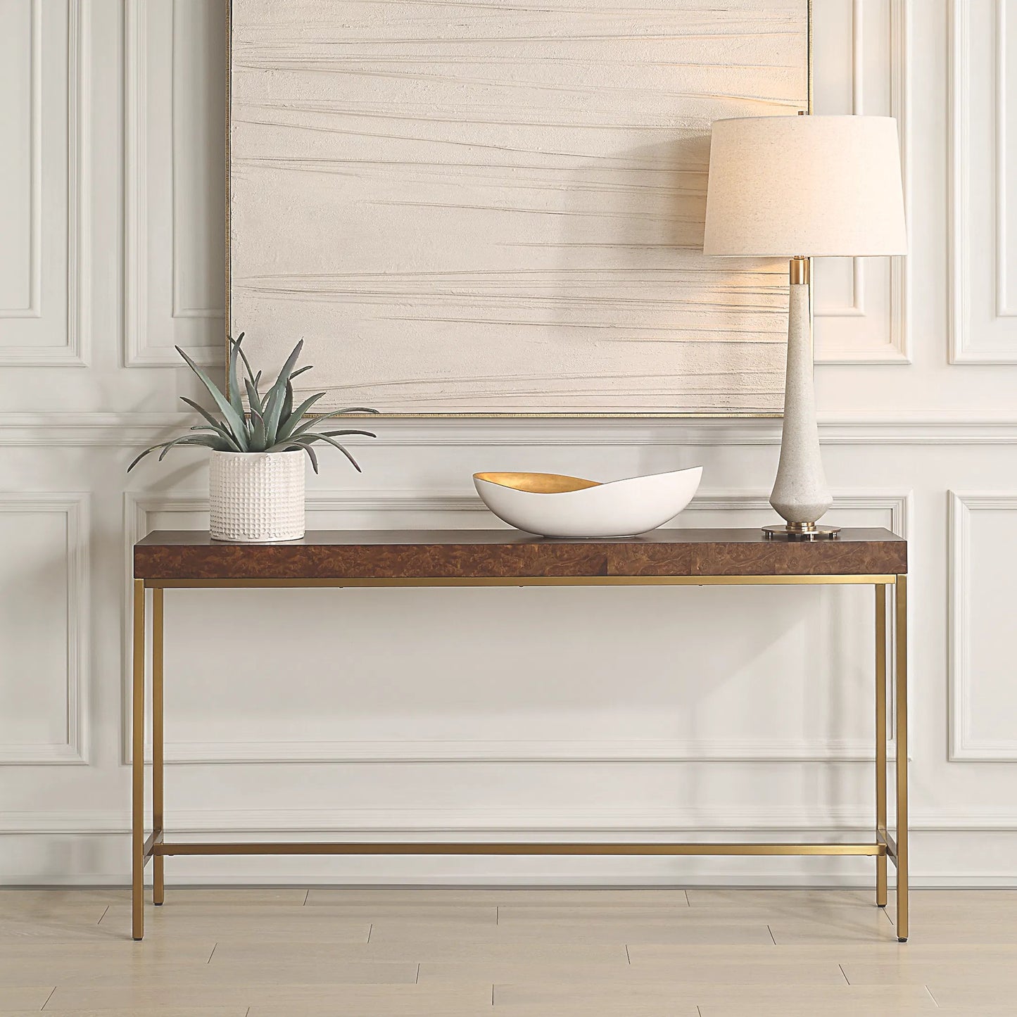 004 SI-2355264 | Lifestyle | Moran Burl Console Table by Uttermost in gold. Made from stainless steel, mdf, burl veneer in a modern style.