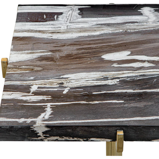 Rowman Petrified Accent Table by Uttermost in gold. Made from patrified wood with stainless steel in a modern style.