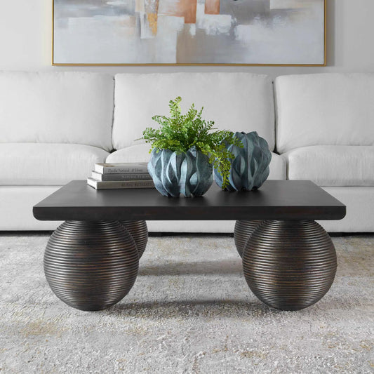 Kasson Sphere Leg Coffee Table by Uttermost in black. Made from mdf mango veneer, javamix wood in a modern style.