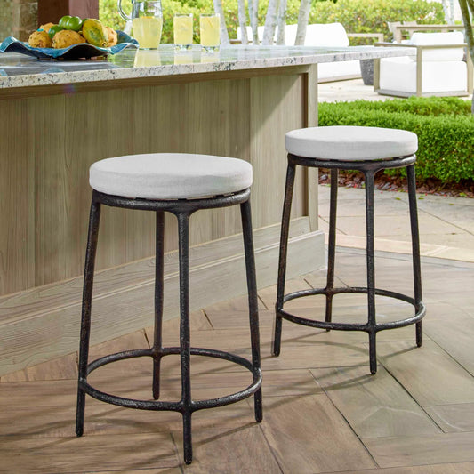 Thayer Outdoor Counter Stool by Uttermost in white, java. Made from aluminium casting in a modern style.