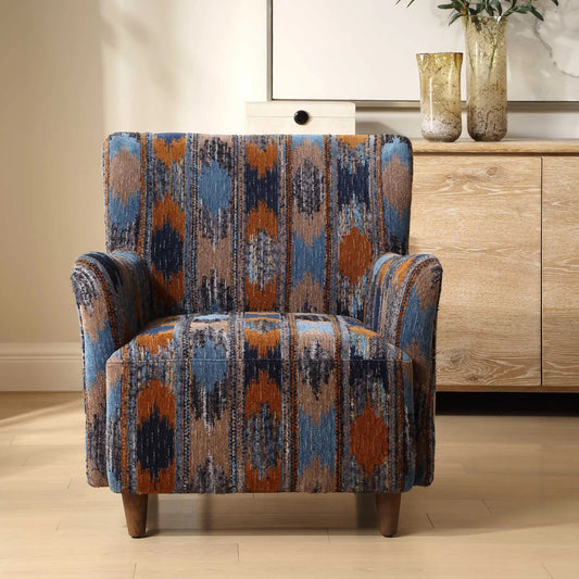 Lainey Upholstered Ikat Armchair by Uttermost in blue, brown, orange and walnut. Made from fabric, foam, plywood, oak in a unique style.