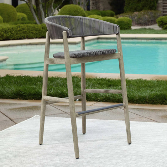 Dermott Indoor/Outdoor Bar Stool by Uttermost in brown and mahogany. Made from mahogany wood, wicker k-rod tera brown 3mm in a unique style.