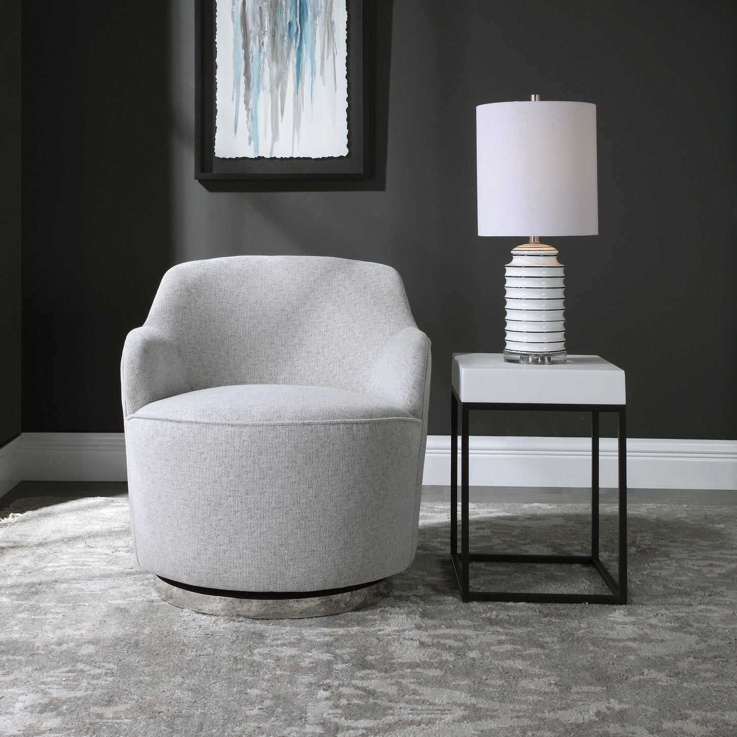 011 SR-766710 | Lifestyle | Hobart Casual Swivel Chair by Uttermost. Made from plywood, stainless steel, fabric, foam in a modern style.