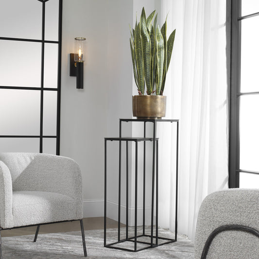 Coreene Nesting Pedestals (Set of 2) by Uttermost in antique bronze. Made from iron, aluminum in a modern style.