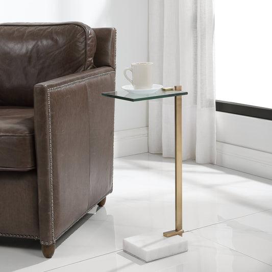 Butler Accent Table by Uttermost in brushed brass. Made from steel, marble in a modern style.