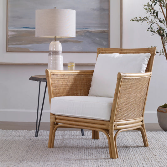 Pacific Armchair by Uttermost in natural, white. Made from rattan with foam, fabric in a coastal style.