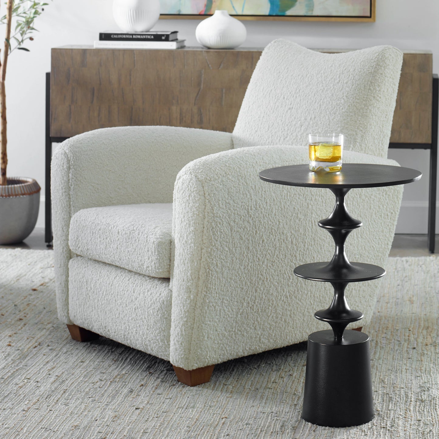 005 SI-2108101 | Lifestyle | Flight Textured Accent Table by Uttermost in black. Made from aluminum in a modern style.