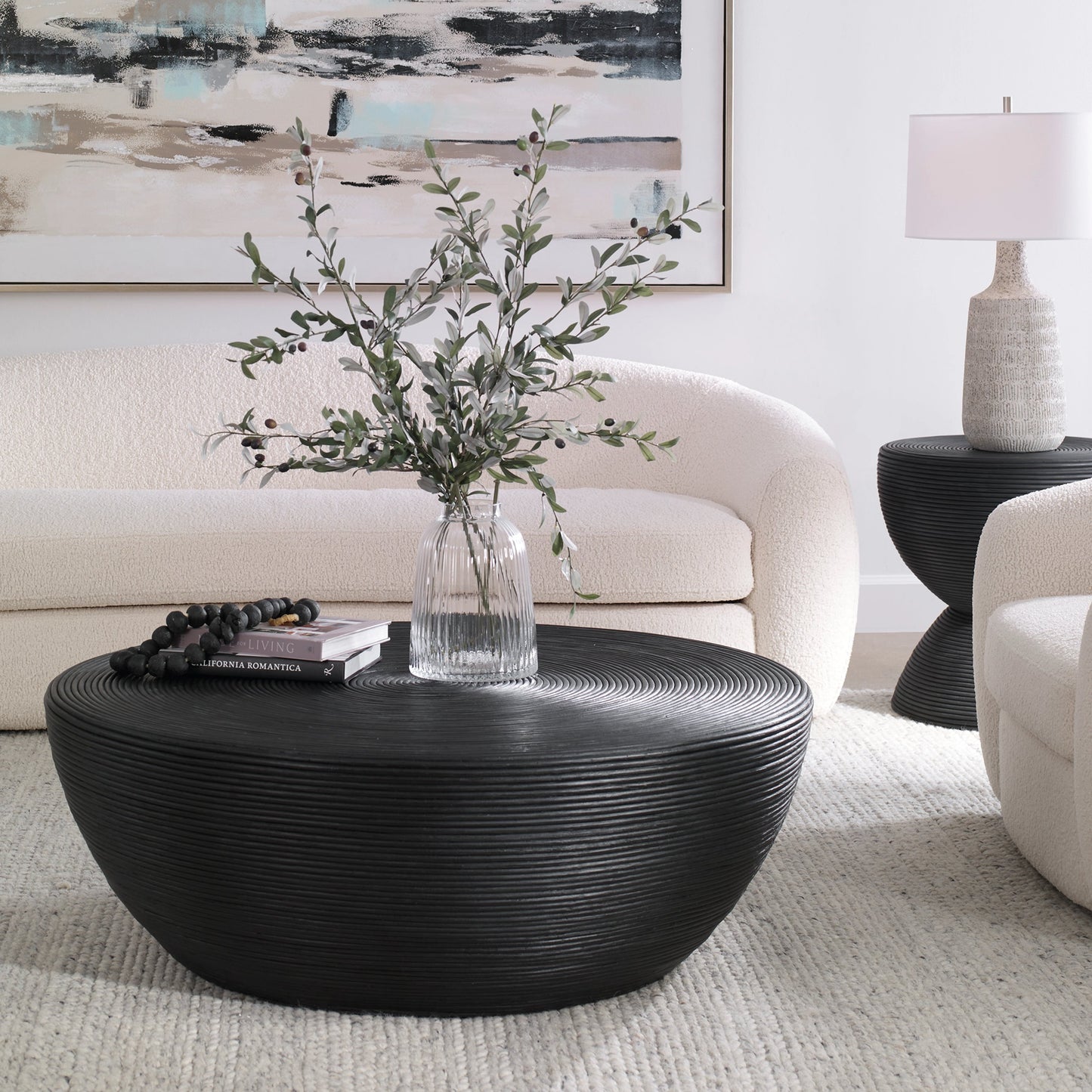004 SI-2016440 | Lifestyle | Bongo Coffee Table by Uttermost in black. Made from core with fabric furing in a modern style.
