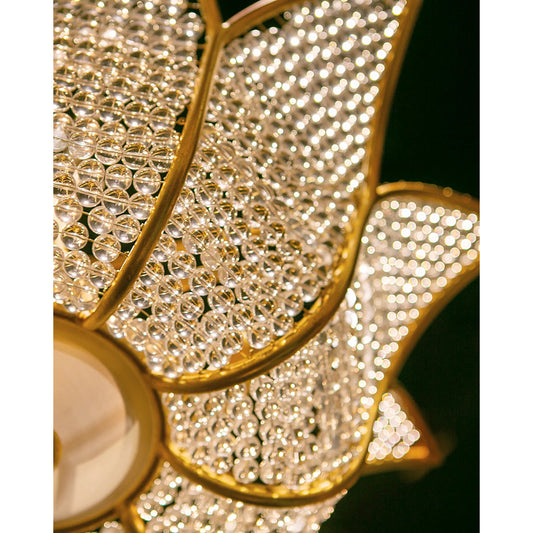 Bebe Chandelier by Currey and Company in contemporary gold leaf, clear. Made from wrought iron, glass beads in a modern style.