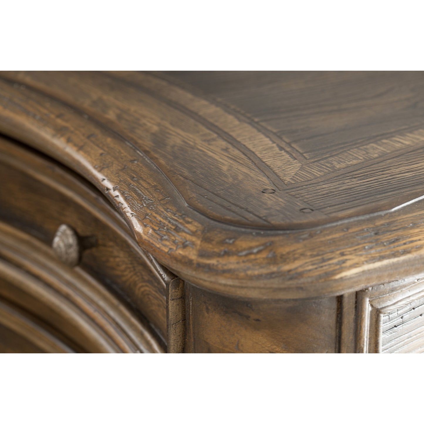 005 SI-1749762 | Closeup | St. Hedwig Executive Desk by Hooker Furniture in saddle brown, anthracite black. Made from white oak, walnut veneers with high quality bonded leather, resin in a traditional style.