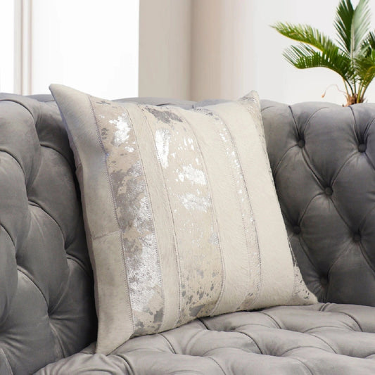 Safari Striped Cowhide Throw Pillow by Pasargad Home in silver. Made from cowhide in a modern style.