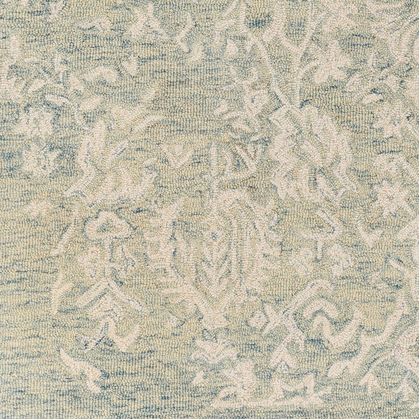 003 SI-1882231,SI-1882232,SI-1882233,SI-1882234 | Closeup | Granada Rug - 29983 by Livabliss in teal, light green, cream. Made from 100% wool in a unique style.