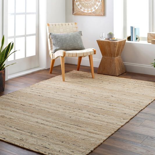 Geneva Rug by Surya in black, charcoal, peach, light beige. Made from 60% jute, 40% wool in a modern style.