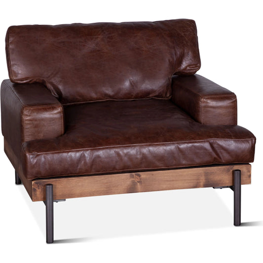 Chiavari Industrial Dover Brown Leather Armchair by World Interiors in geisha brown, antique zinc, medium walnut. Made from leather, iron, oak in a transitional style.