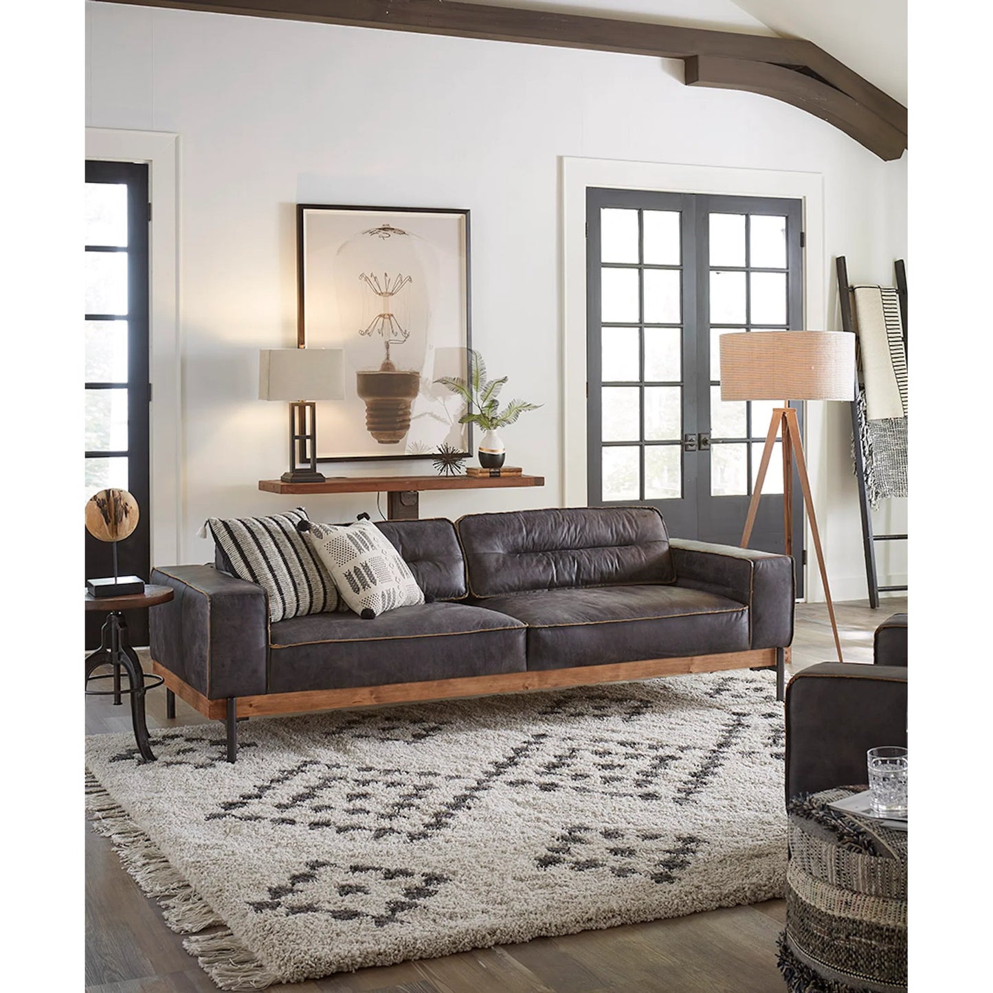 008 SR-876932 | Unknown | Chiavari Antique Leather Sofa by World Interiors in black and matte. Made from leather, foam, oak wood, iron in a modern style.