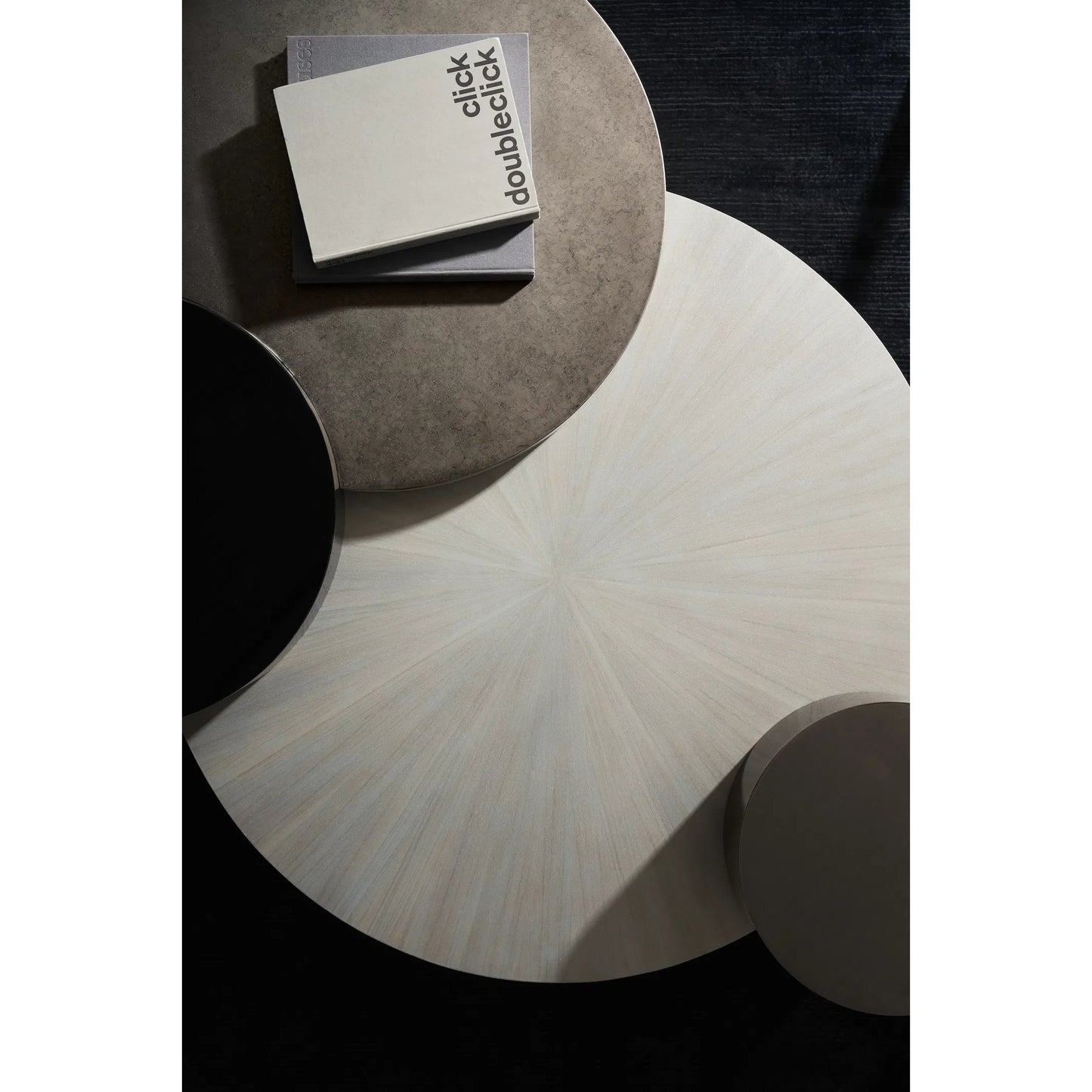 002 SI-2162965 | Lifestyle | Constellation Cocktail Table by Caracole in black and silver burst, piano black, twilight frost, brushed tungsten. Made from birch, metal in a modern style.
