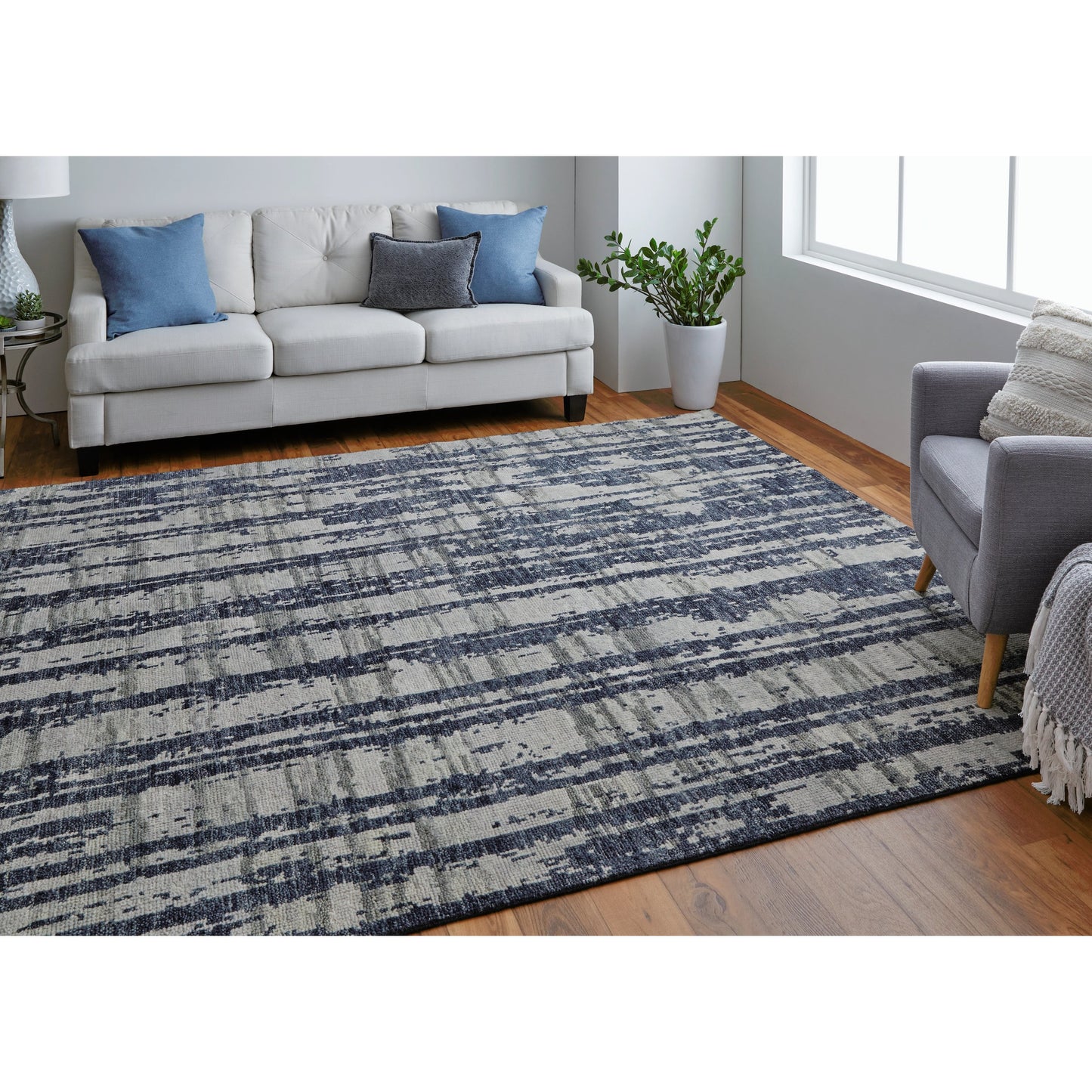 009 SI-2159052,SI-2159056,SI-2159058 | Lifestyle | Altmar Rug - T18T6035 by Thom Felicia by Feizy Rugs in blue, gray, taupe. Made from wool in a unique style.