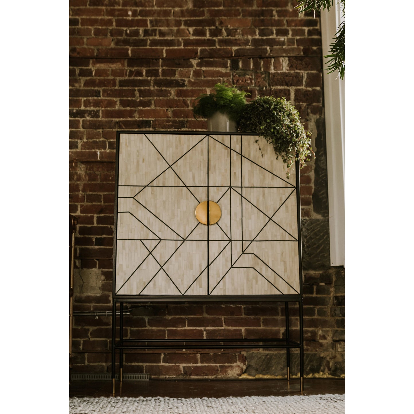 007 SI-2122068 | Lifestyle | Shaws Cabinet by Moe's Home Collection. Made from solid mango cabinet, bone veneer, iron base, mdf in a modern style.